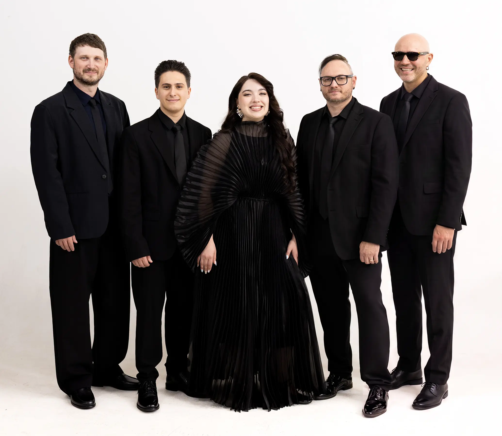 Luma Cover Band — five members in black attire
